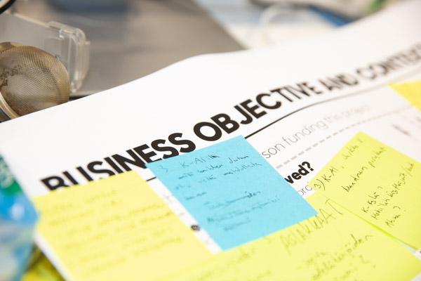 A Futurice planning canvas showing business objectives on post it notes